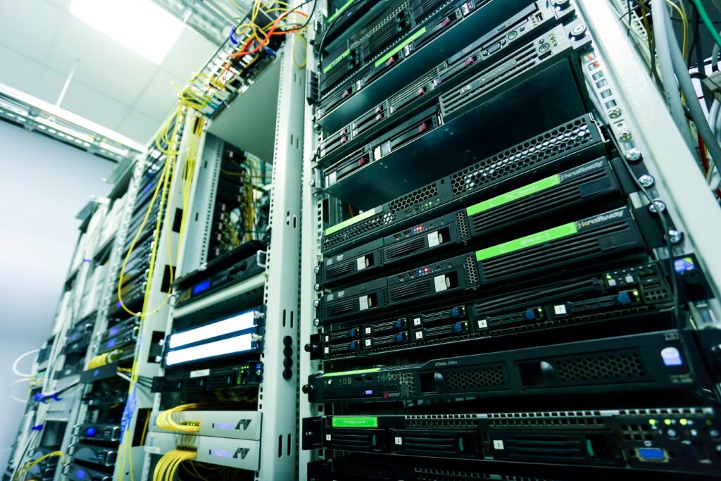 High-tech server rack in a secure data center with network cables and hardware components.